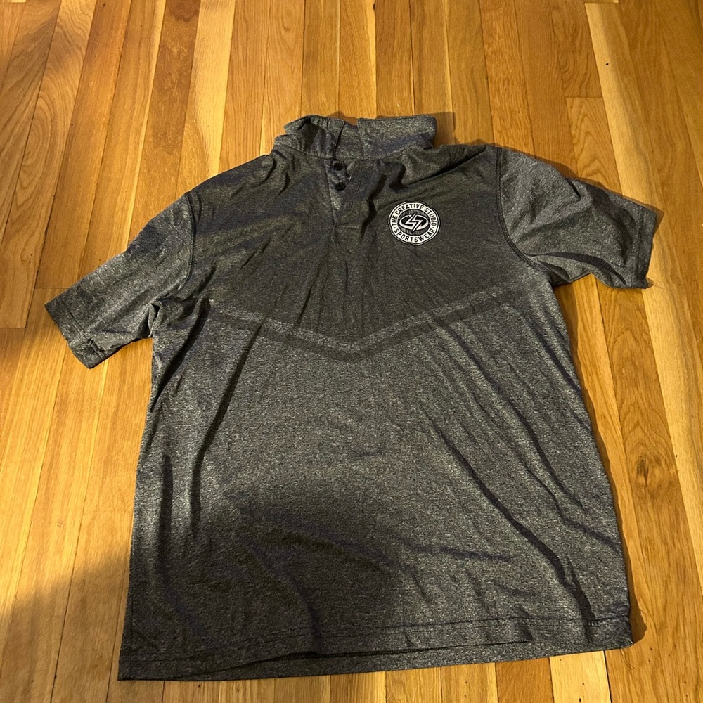 Used Men’s Holloway Gray Polo Shirt with logo
Size Large